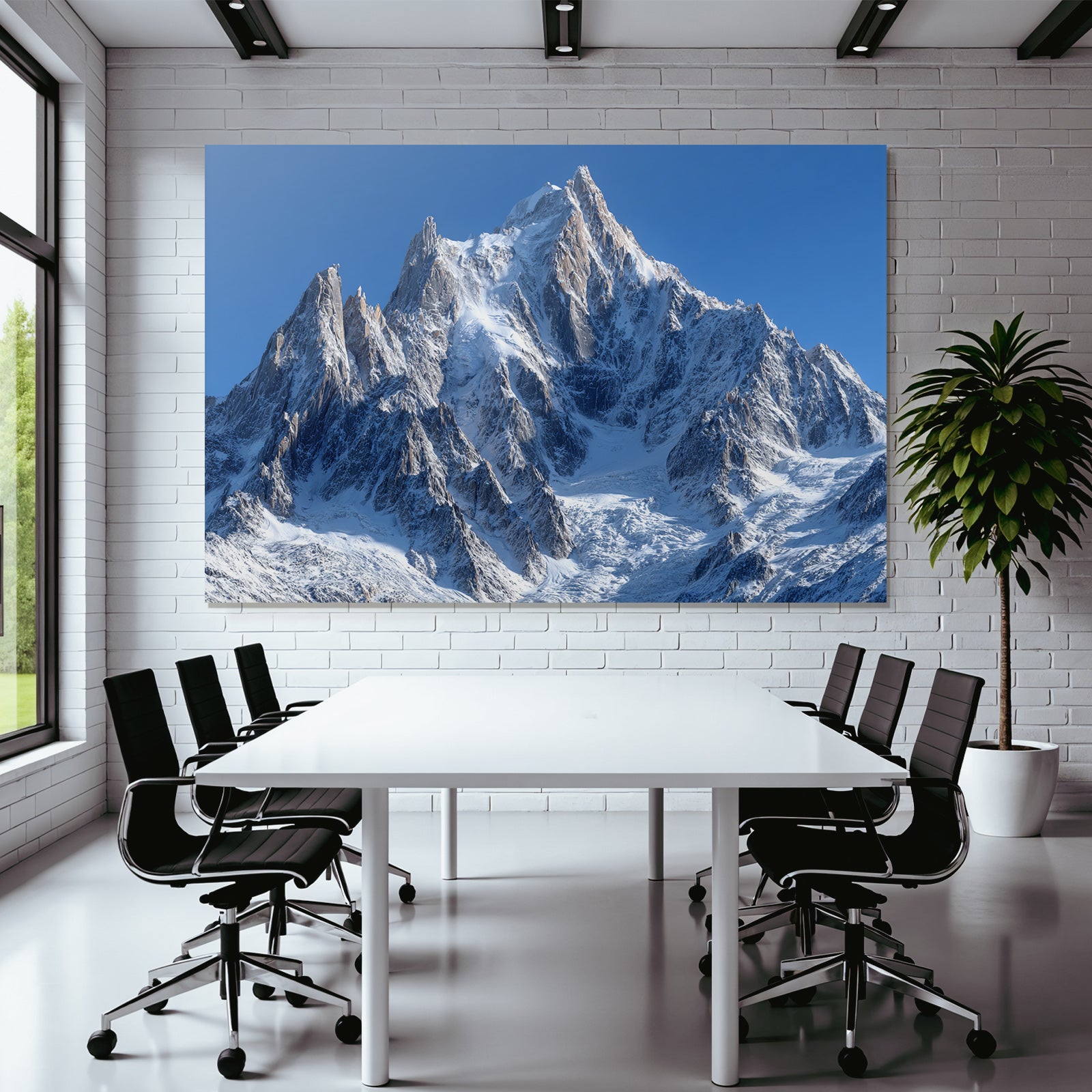 Winter Majestic Snow-Covered Mountain Scene Under a Clear Blue Sky