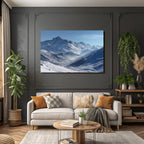 Winter snow-covered mountain landscape with clear sky and fog