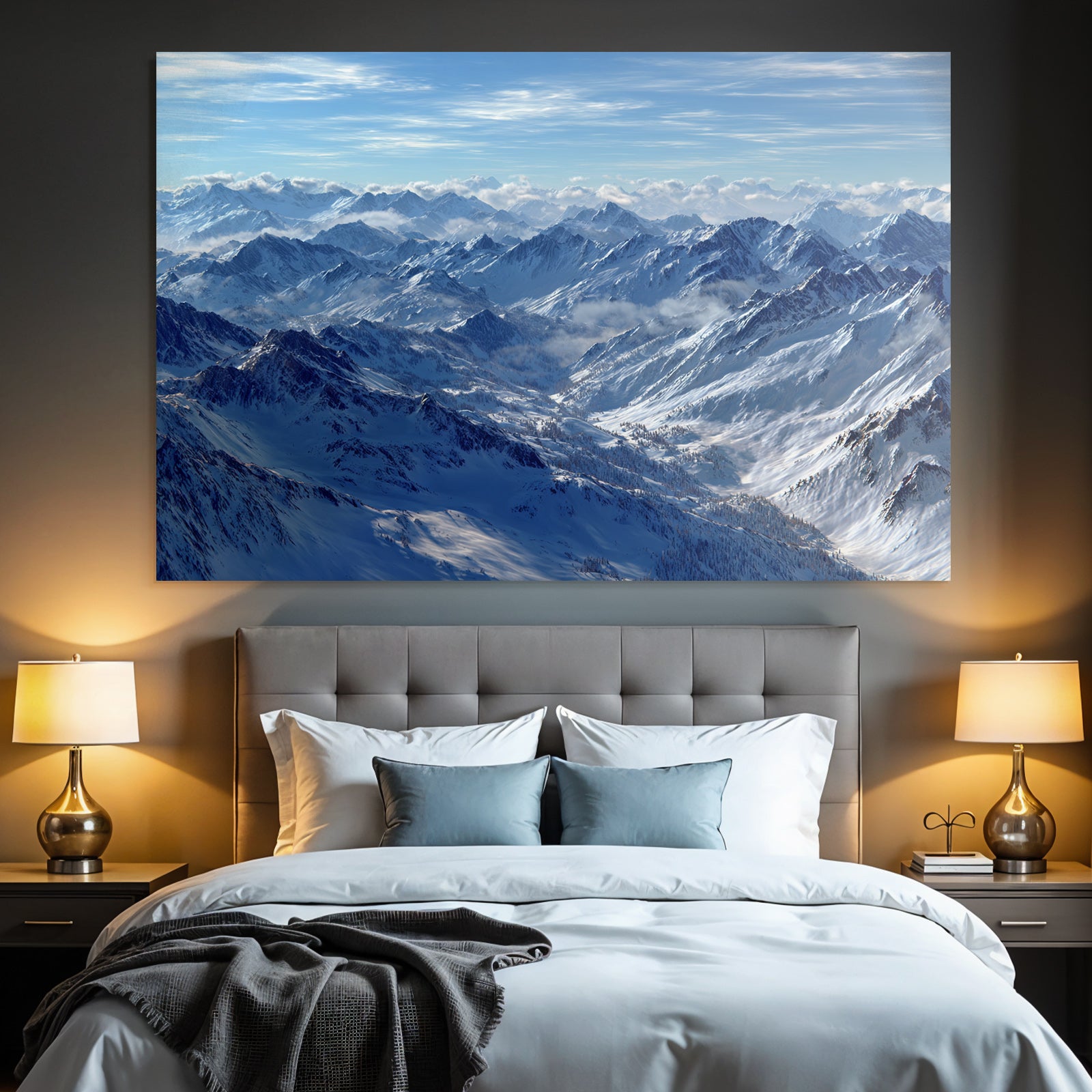 Winter snow-covered mountains under blue sky with clouds