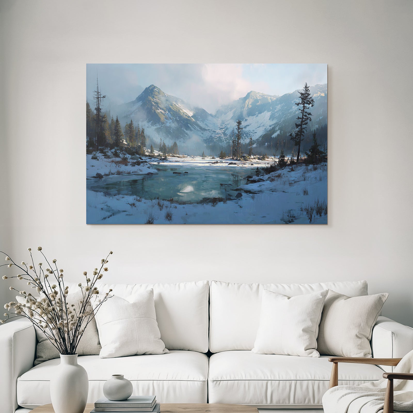 Winter landscape with snow-capped mountains and calm water
