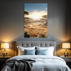 Desert driving landscape with grassland and snow-capped mountains at sunset