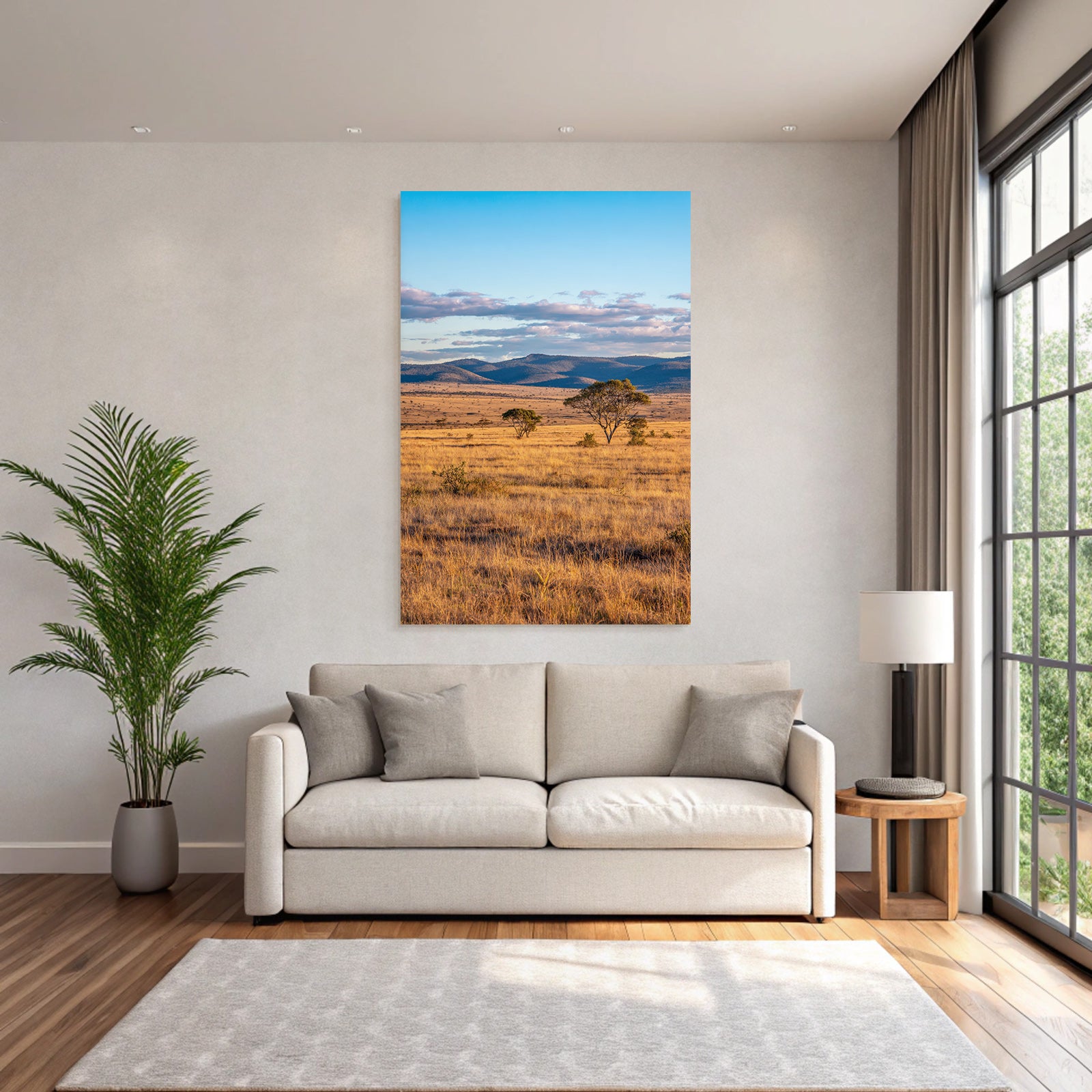 Desert golden grass landscape with trees and hills under blue sky