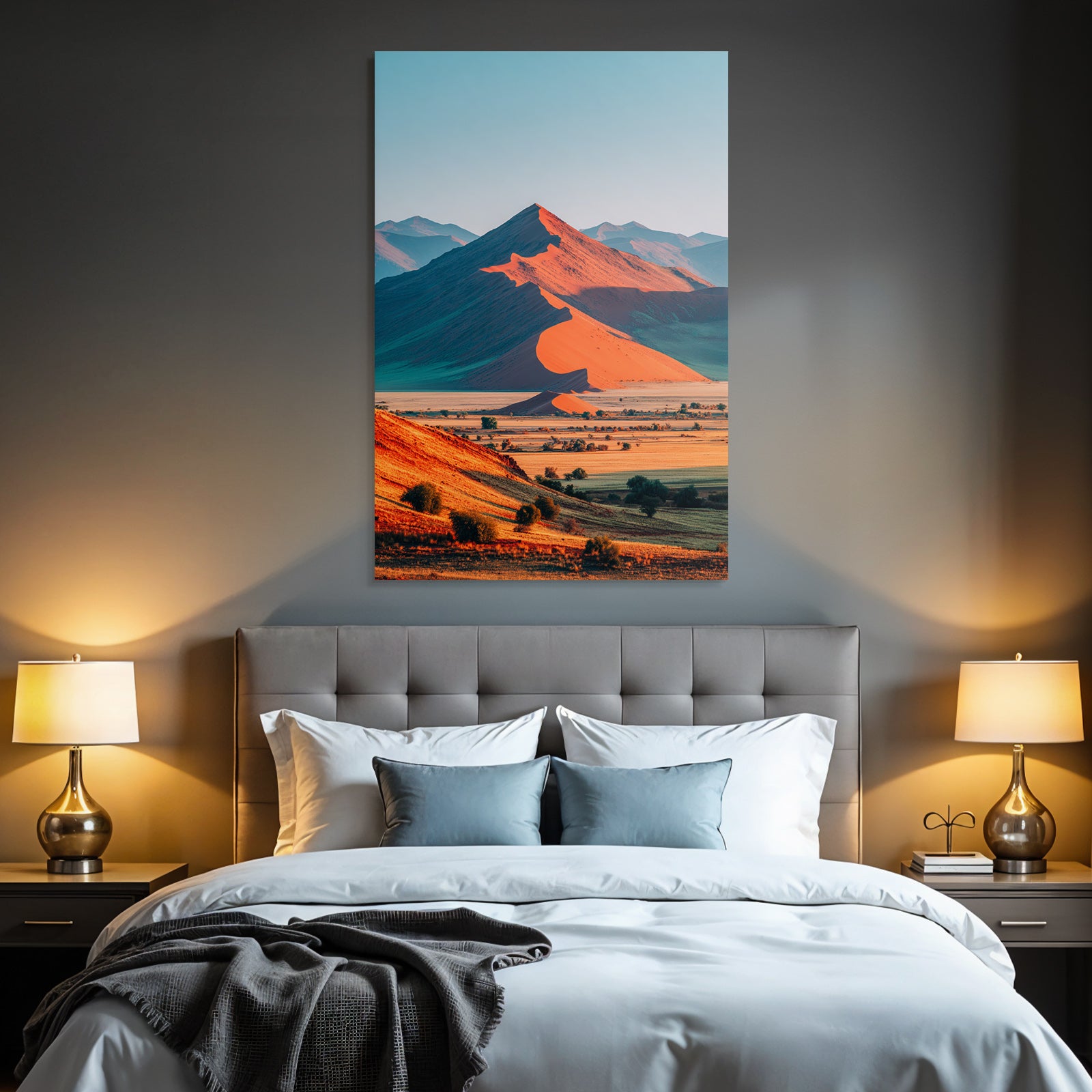 Desert sand dunes and mountains at sunrise or sunset