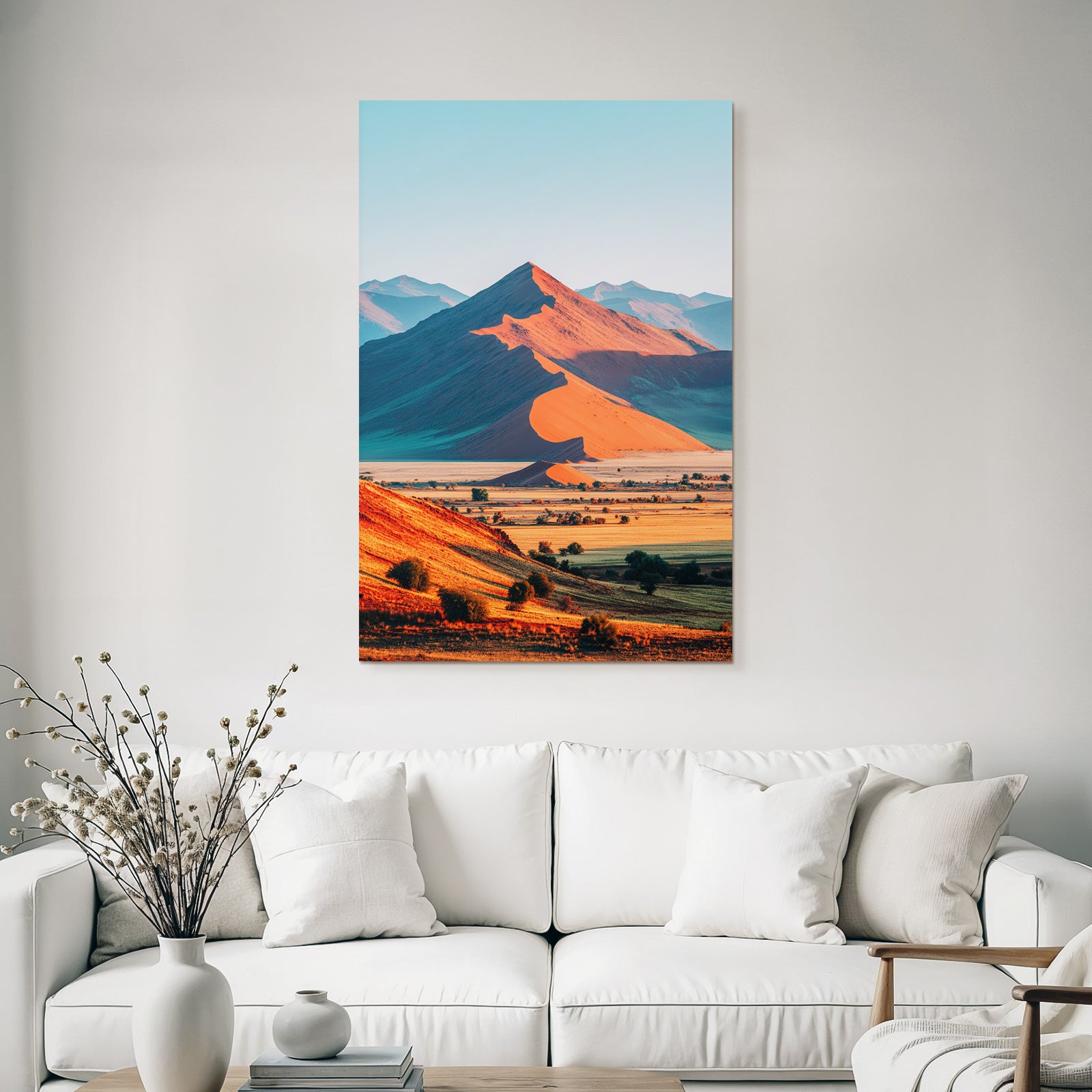 Desert sand dunes and mountains at sunrise or sunset