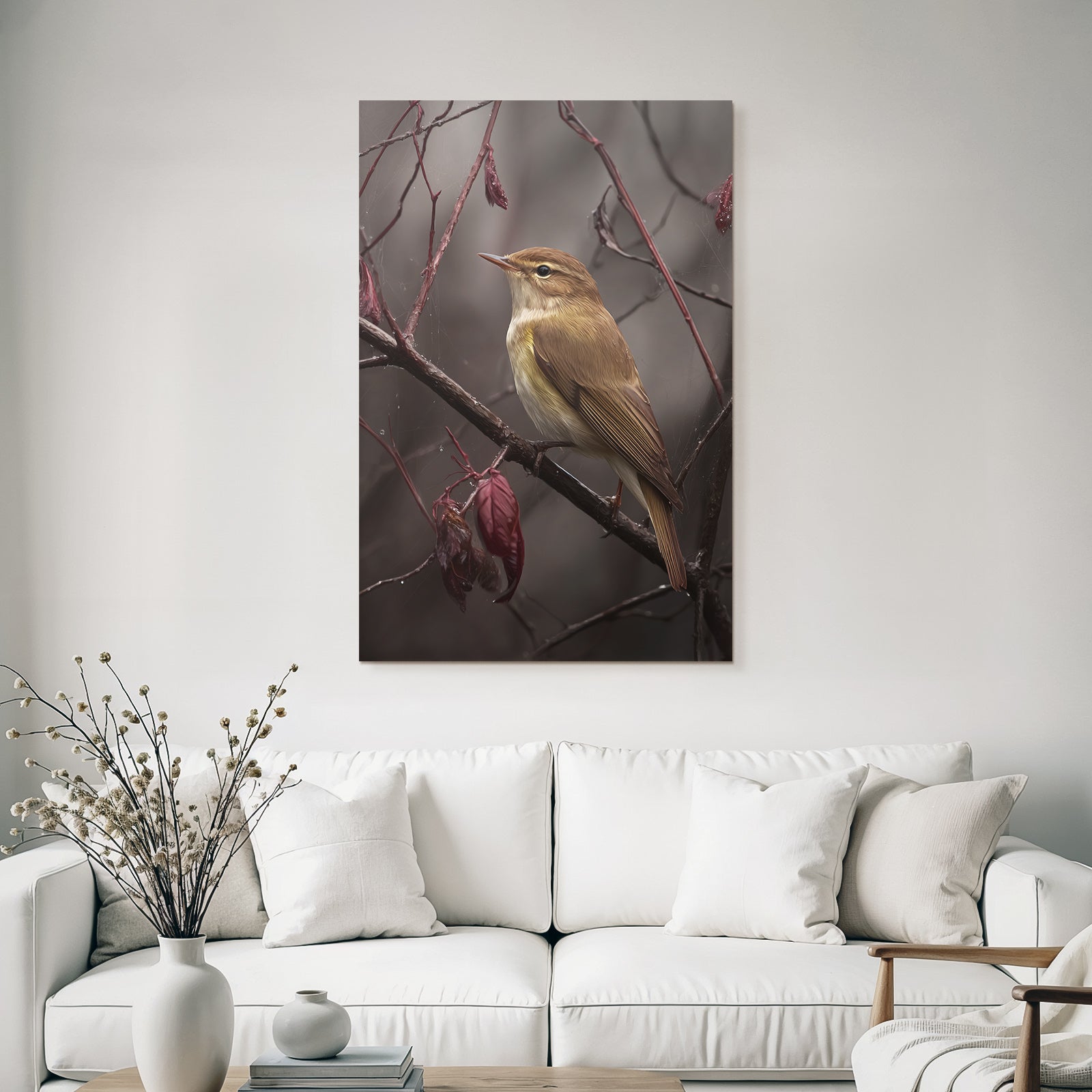 Desert bird on a branch with red foliage in nature