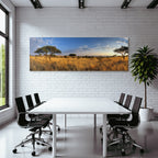 Desert panoramic view of savannah with golden grasslands and blue skies