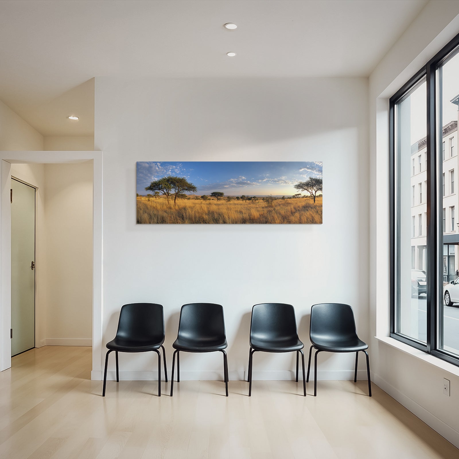 Desert panoramic view of savannah with golden grasslands and blue skies