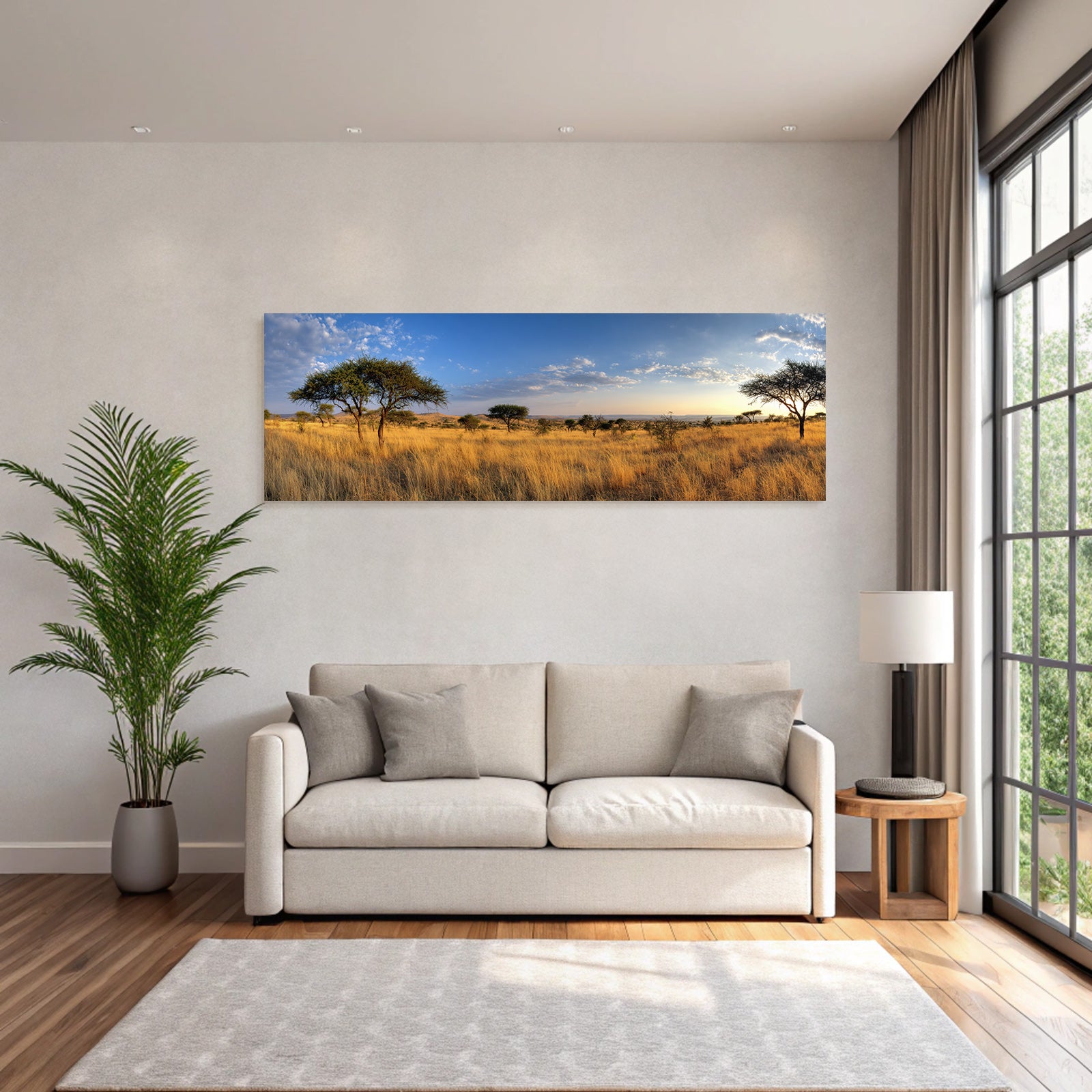 Desert panoramic view of savannah with golden grasslands and blue skies