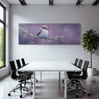 Desert bird on a branch surrounded by soft blurred colorful colors