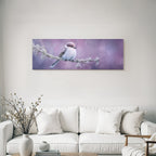 Desert bird on a branch surrounded by soft blurred colorful colors