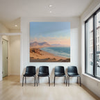 Desert beach idyll at sunrise or sunset with mountains background