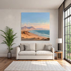 Desert beach idyll at sunrise or sunset with mountains background