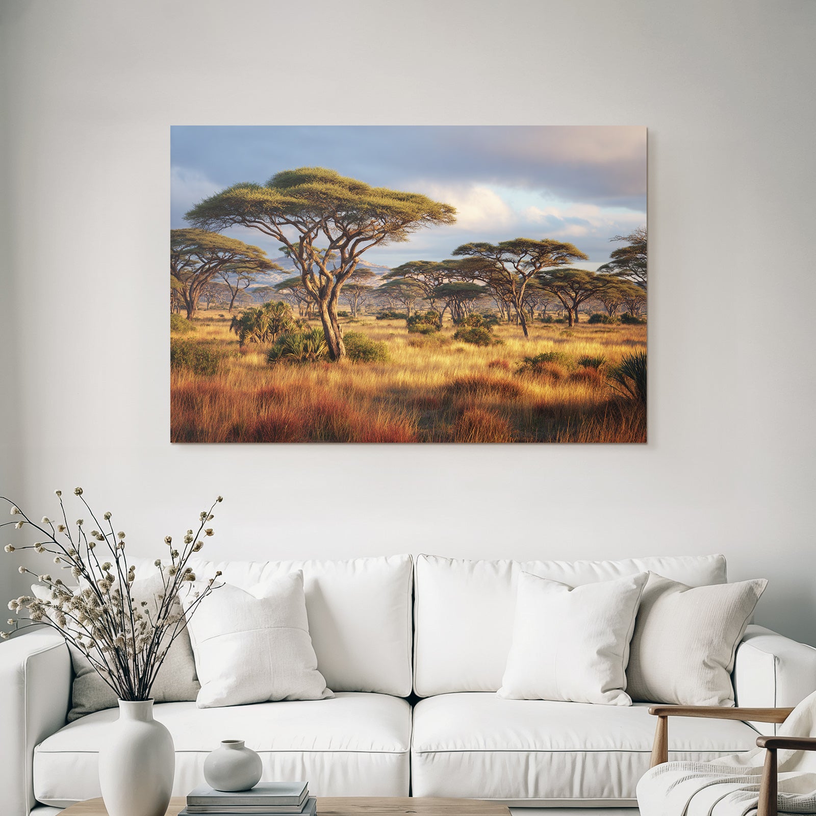Desert savannah with acacia trees and tall grass at sunset