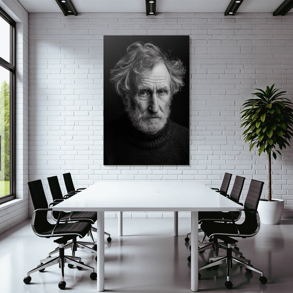 Portrait of an older man with messy hair and a serious expression