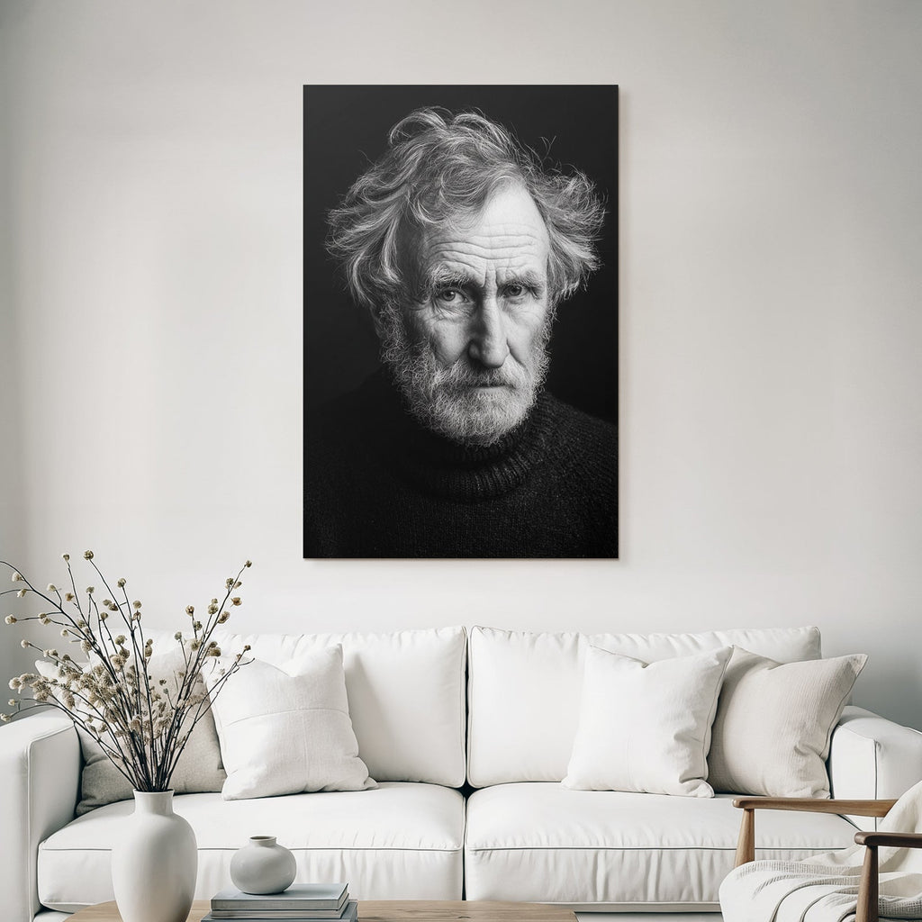 Portrait of an older man with messy hair and a serious expression