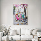 Colorful Bikes In Flowery View With Stone Pathway And Light-colored Background