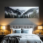 Mystical mountain landscape in fog with dense coniferous forests