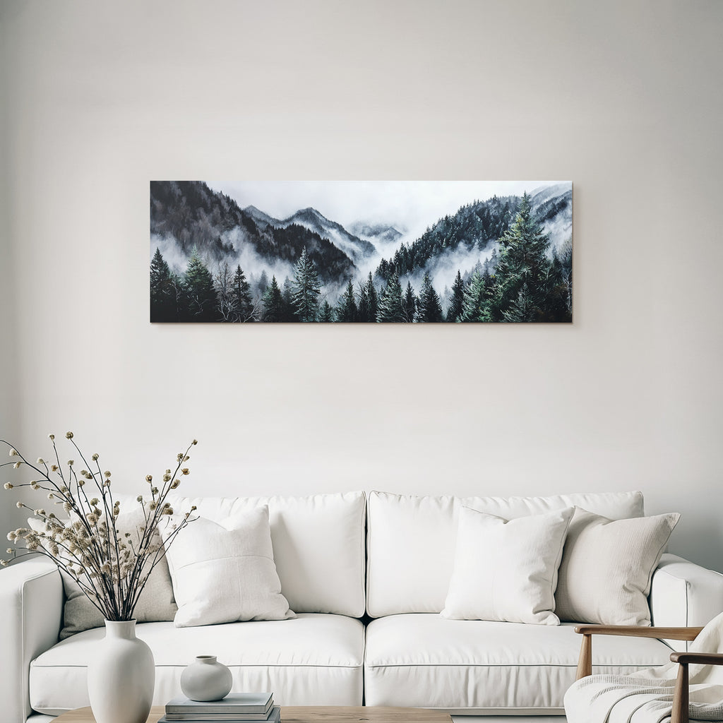 Mystical mountain landscape in fog with dense coniferous forests