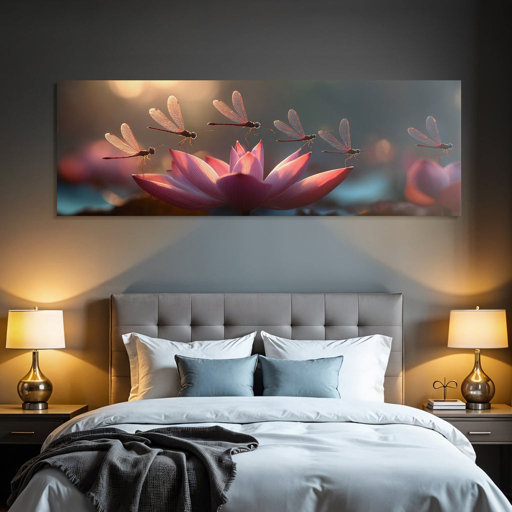 Dragonflies hover around a pink lotus flower