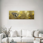 Butterfly on a yellow flower with blurred background