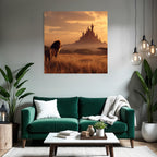 Majestic Lion Looking Towards A Castle At Sunset In Open Landscape